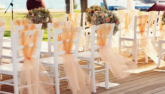 chairs set up at an outdoor wedding